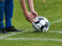 footballer readying himself to take a corner