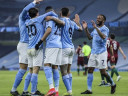 Man City players celebrating after scoring